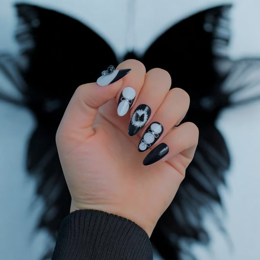 3D almond gel nails with black and white design
