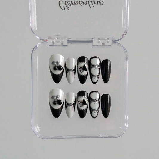 3D almond gel nails with black and white design